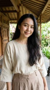 woman wearing beige blouse pants 202607031342